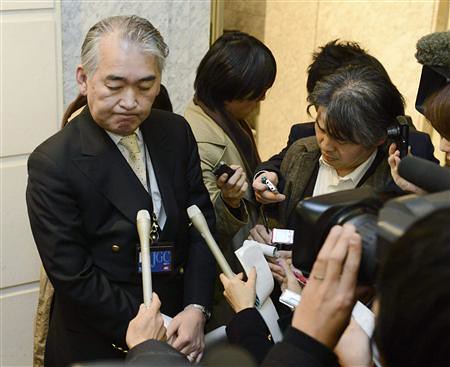A Public Relations staff of JGC Corp answers reporters' questions regarding Japanese nationals who were kidnapped in Algeria, at its headquarters in Yokohama, south of Tokyo in this photo taken by Kyodo January 16, 2013. by Pan-African News Wire File Photos
