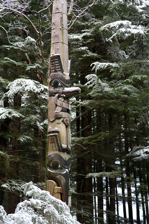 snow on a totem in the Totems Historic District, Kasaan, Alaska