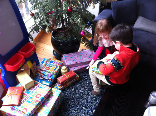 Scott and Elaine unpacking the presents at Christmas morning