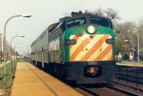 Westbound Burlington Northern Railroad  /  Early Metra local commuter train arriving at the Harlem Avenue station.  Berwyn Illinois.  April 1988. by Eddie from Chicago