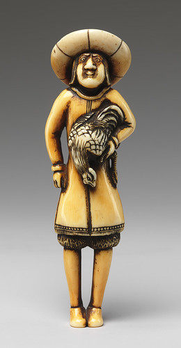 022- Netsuke -Extranjero que lleva un gallo -siglo 19-en marfil- Metropolitan Museum of Art