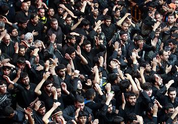 Shiite Muslims celebrate the festival of Arbaeen in Karbala, 50 miles south of Baghdad, Iraq. Seventeen people were reportedly killed in car bombings on January 3, 2013. by Pan-African News Wire File Photos