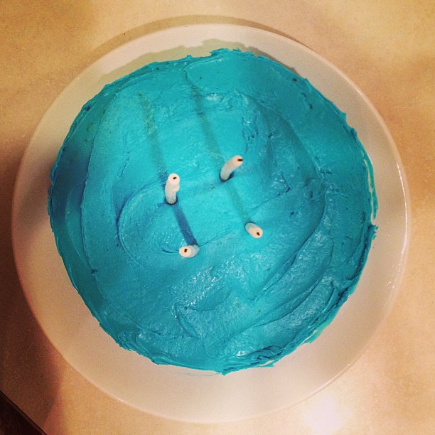 Desecrated a lovely chocolate hazelnut torte with blue frosting. #birthdayboygetswhathewants