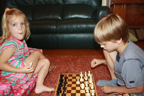 Alexander teaching Cece Chess