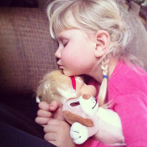 Snuggled with her new doll and puppy. Early morning has caught up with her. #hannahbaby #couldeatherup #snugglewhileyoucan #lovemygirl