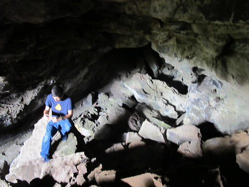 Exploring a lava Tube near Kamilo Beach, Hawaii