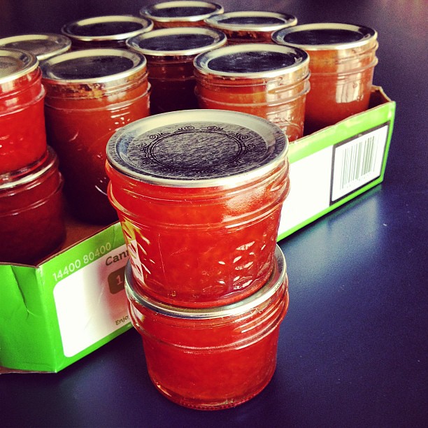 About to label and put away this week's canning ventures- Grapefruit Jam and Caramel Pear Butter