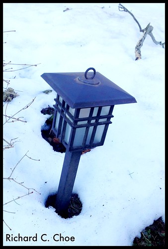 Lamp in Snow by rchoephoto