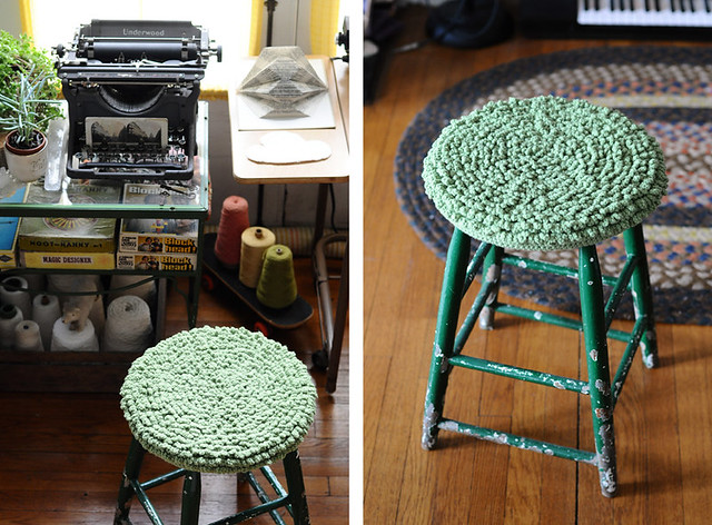green crocheted stool cover