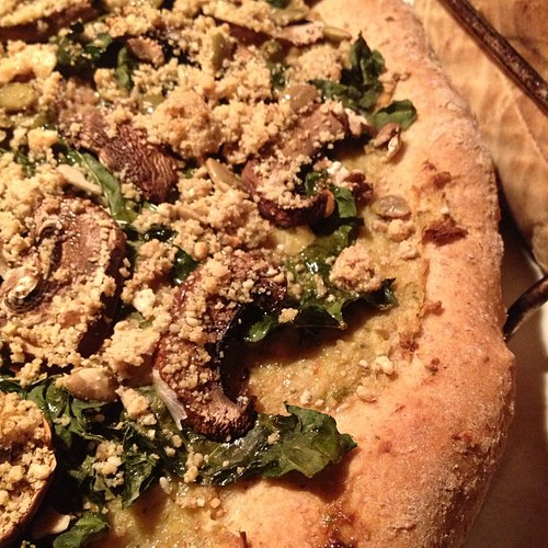 Whole wheat pizza dough, lemon artichoke pesto, kale, mushrooms, crumbled nut blend #vegan