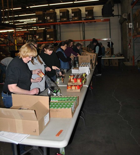 USDA Employees recently helped to pack nearly 10,000 food items into backpacks for local children at a food distribution center in Topeka.