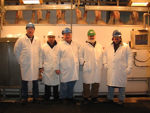 USDA Certified Industry Beef Graders pause for a picture. Pictured are Glen Powers, Albert Navarro, Mike Schulp, Jeremy Schuoler, and USDA grader Cory Barnes. Adapting new strategies for meat grading helped one company reduce meat grading costs for by 50 percent.