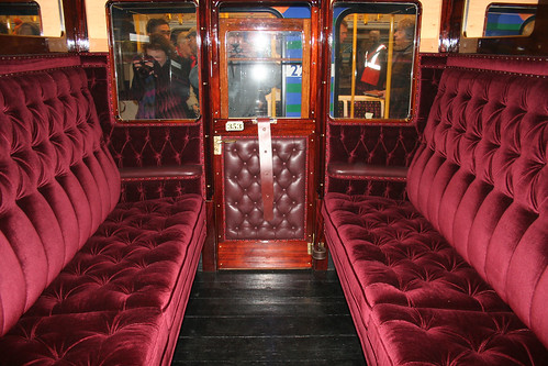 The plush interior of the restored carriage