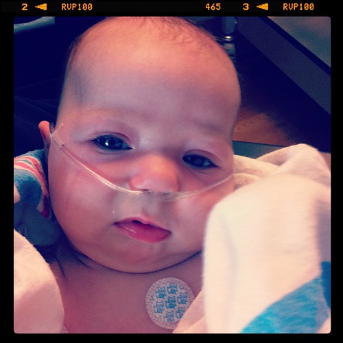 Sweet girl is on oxygen, lots of suctioning, breathing treatments, and lots of cuddling with her mommy and daddy.