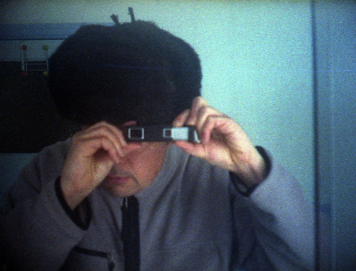 reflected self-portrait with Kiev 30 camera and Russian hat by pho-Tony