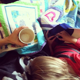 Snuggled up Gigi, a latte and our first Sparkle Stories audio book, on a rainy day. #homeschoolingisawesome
