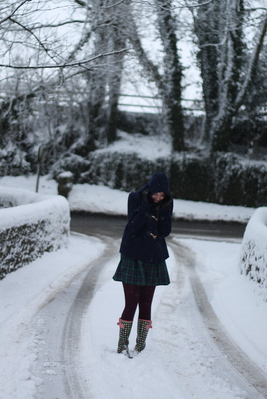 Snow - duffle coat, tartan skirt, wellies