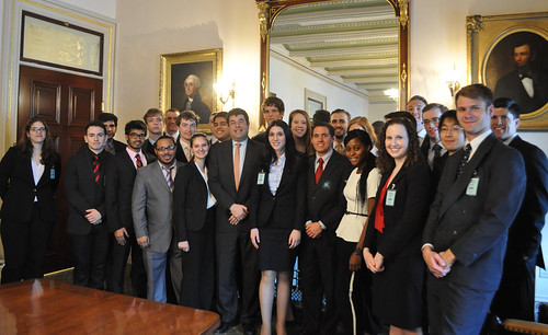 Fordham University students pose for a group photo with Deputy Secretary Neal Wolin