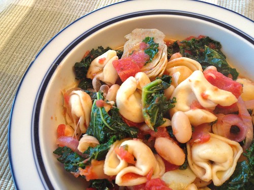 Tuscan Tortellini with Kale and Artichokes - A one pot meal ready in under 30 mins! From Buttercream Lane and Factwoman