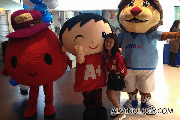 The respective mascots from The Straits Times Little Red Dot, The Big Spell and RHB Bank 