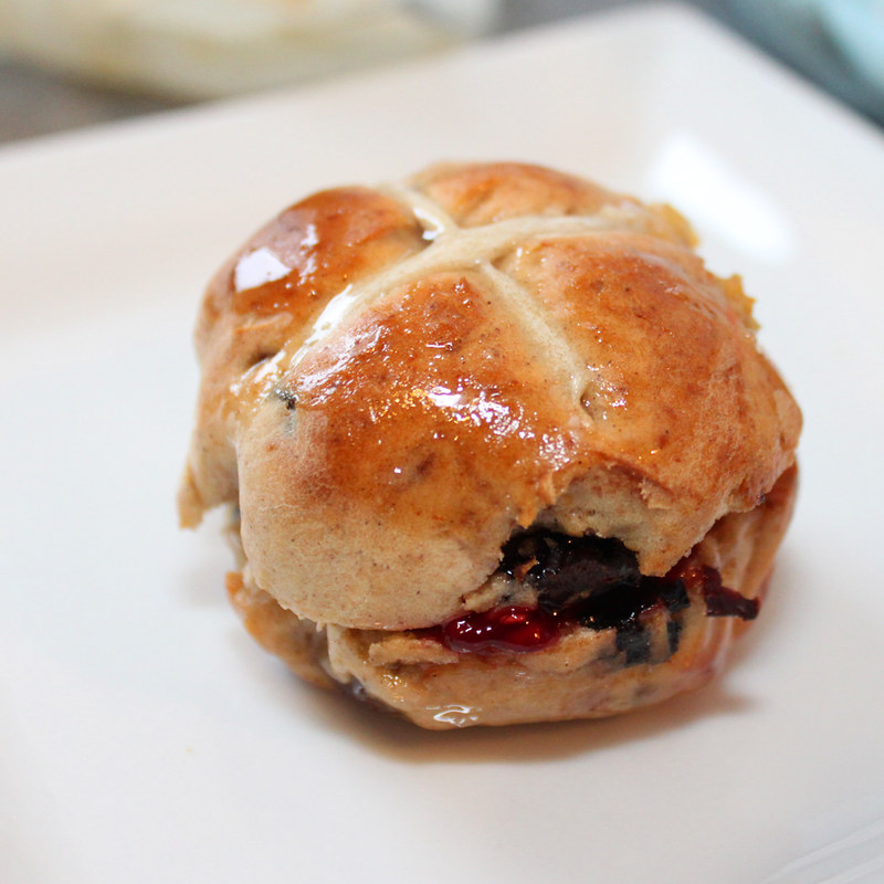 Hot Cross Muffin Buns split with Raspberry Jam