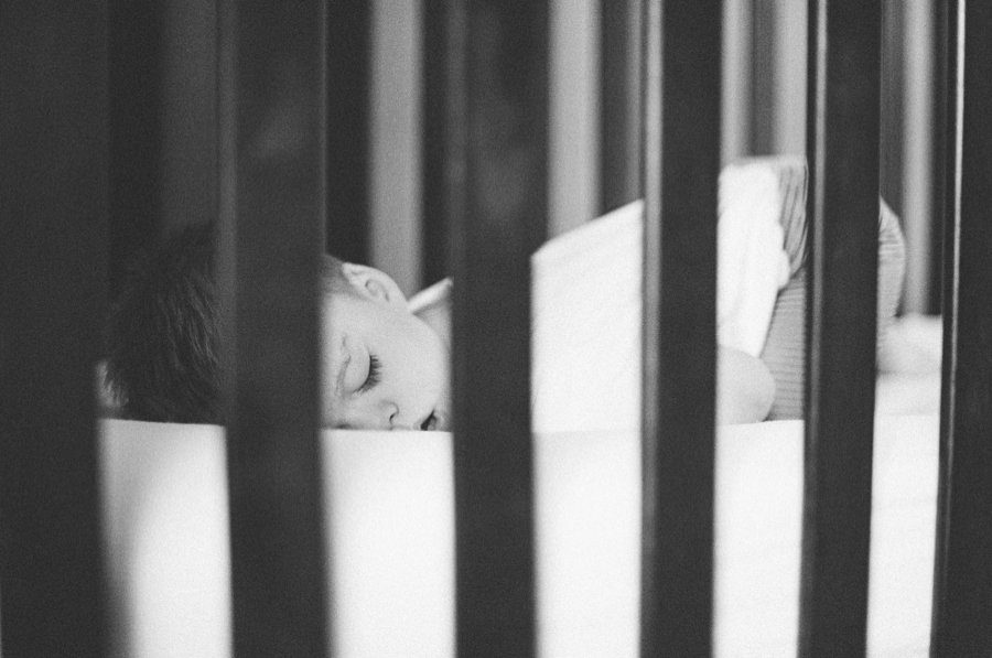 black and white photo of sleeping toddler north dallas