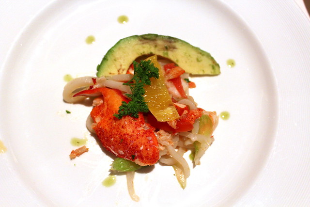 Trio of Seafood, Citrus and Avocado lobster, shrimp and squid with orange filets and lime-cilantro vinaigrette