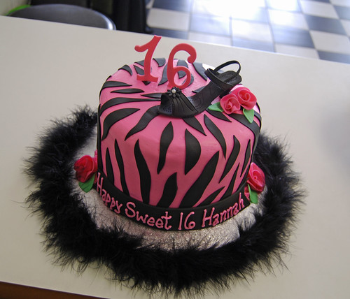 pink and black sweet 16 zebra cake with high heel shoe