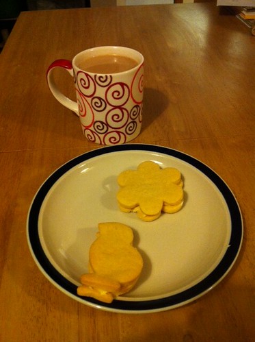 Eating these what I just baked. Custard creams in shapes of birds and flowers. by benparkuk