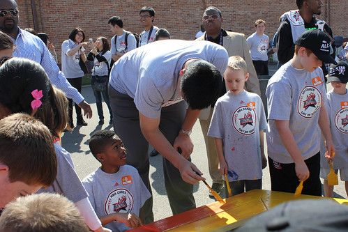 February 15th, 2013 - Yao Ming paints a bench at the NBA Day of Service in Houston