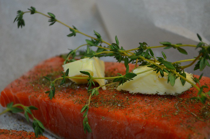 Add butter and thyme to salmon | My Halal Kitchen