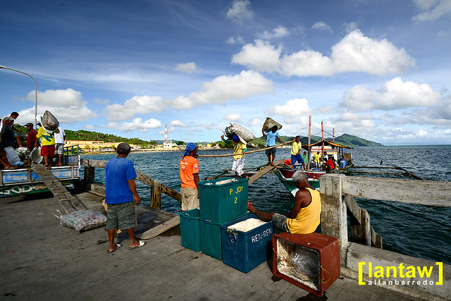 Offloading produce from nearby Alabat island