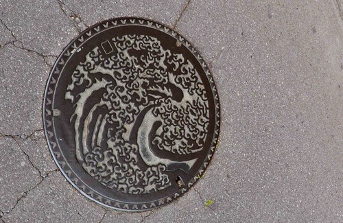 Hokusai Angry Waves Sewer Plate