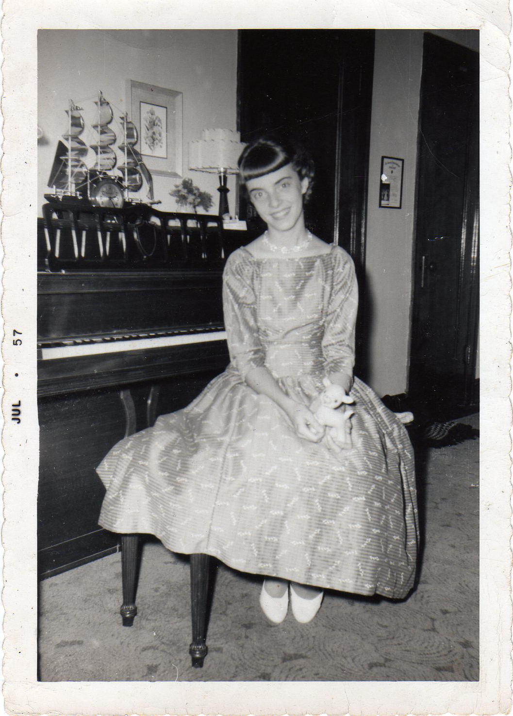 mom on piano bench