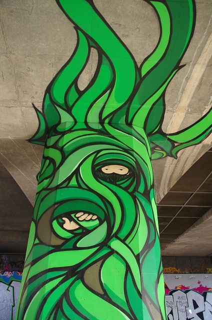 Hiding in Concrete Jungle - Adelaide street art