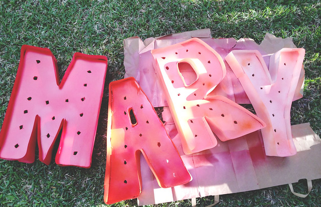 mary letters being painted