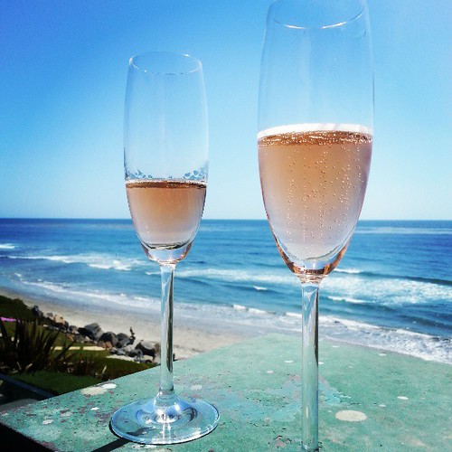 Eh, ya know. .. just enjoying a sparkling rosè, watching some surfers... the usual. ..