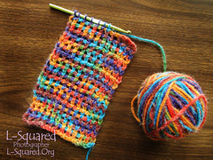 Tunisian mesh scarf - made with rainbow colored yarn - in progress, just a few inches complete.