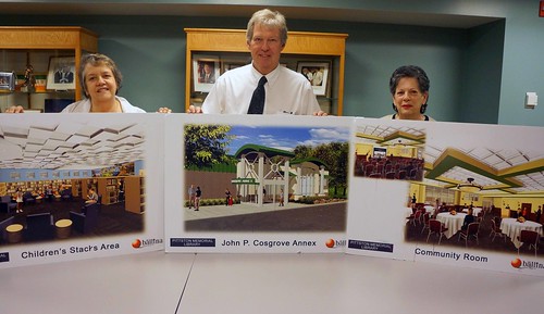 (L to R) Anne Hogya, Pittston Library Director , Thomas Williams, USDA Rural Development State Director, and Barbara Quinn, Library Board President, display artist renderings of the library expansion slated to begin this summer. USDA photos.