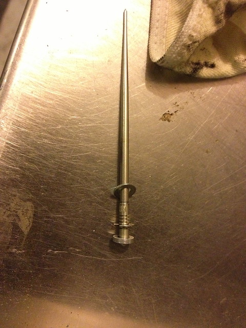Needle with the stuck lower washer