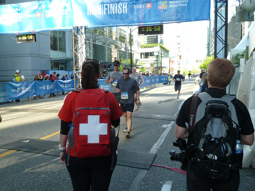 Crossing the finish line of the Vancouver Half Marathon
