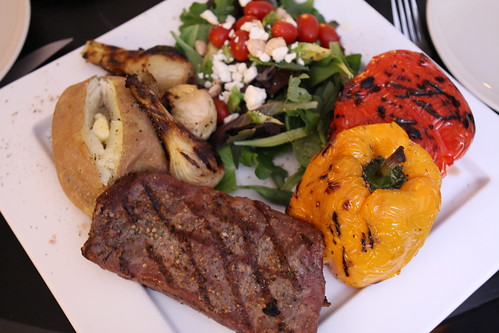 Grilled Flank Steak, Baked Potato, Grilled Spring Onions, Bell Peppers, and Salad