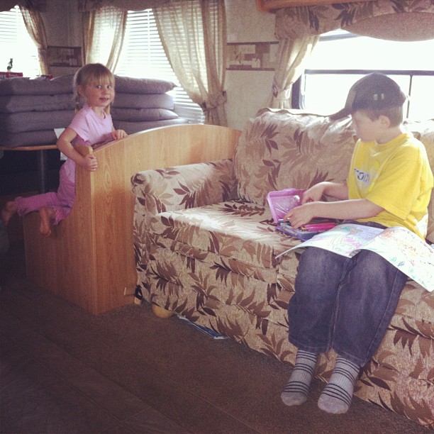 Back to the trailer to get it opened and cleaned out! Kids were thrilled to find last year's colouring books. ;) #easytoplease #camping #cmig365apr