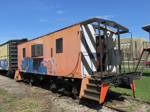 A former Chicago, South Shore And South Bend Railroad caboose decaying on a park display train.  Hammond Indiana.  Sunday, April 21st, 2013. by Eddie from Chicago