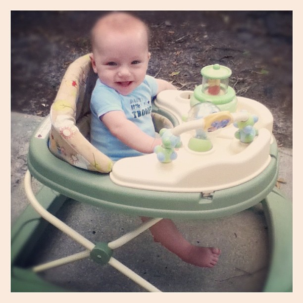 Something I love to have for baby: a walker!! His feet don't touch yet, but wait til they do!!!