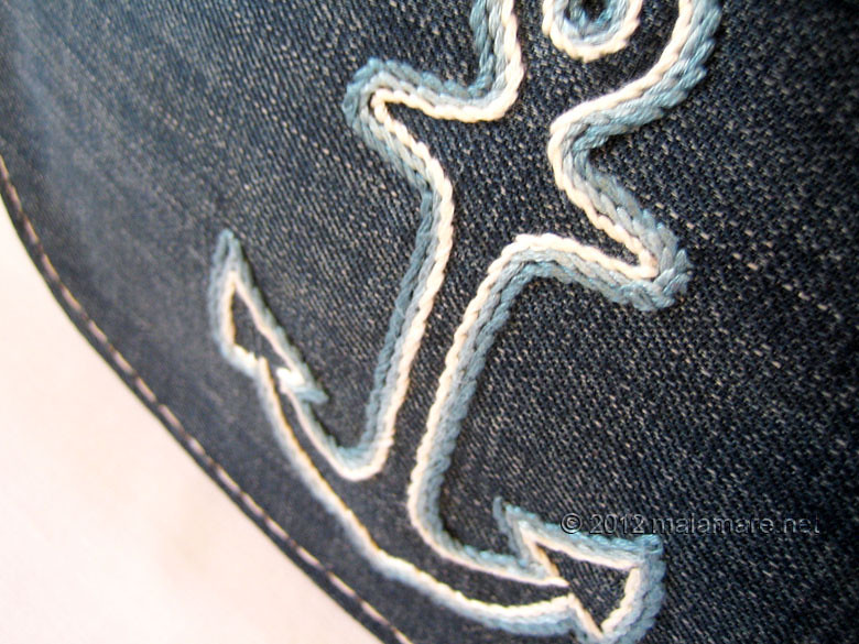 upcycled blue jeans clutch bag with hand embroidered anchor stem stitch