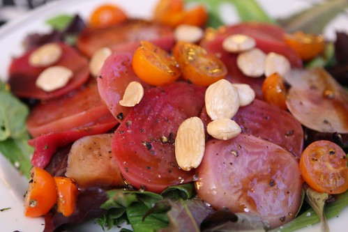 Chiogga Beet Salad with Sun Gold Tomatoes, Marcona Almonds, and Balsamic Glaze
