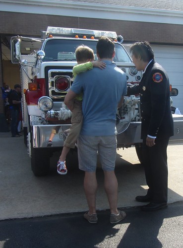 firefighter shows off the truck