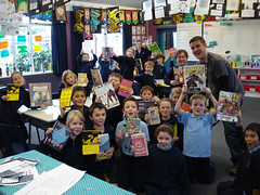 Year 4 of St Alban's Primary School with librarian Zac