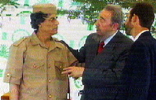 Martyred Libyan leader Col. Muammar Gaddafi speaking with former Cuban President Fidel Castro. Cuba and Libya have faced the wrath of US imperialism. by Pan-African News Wire File Photos